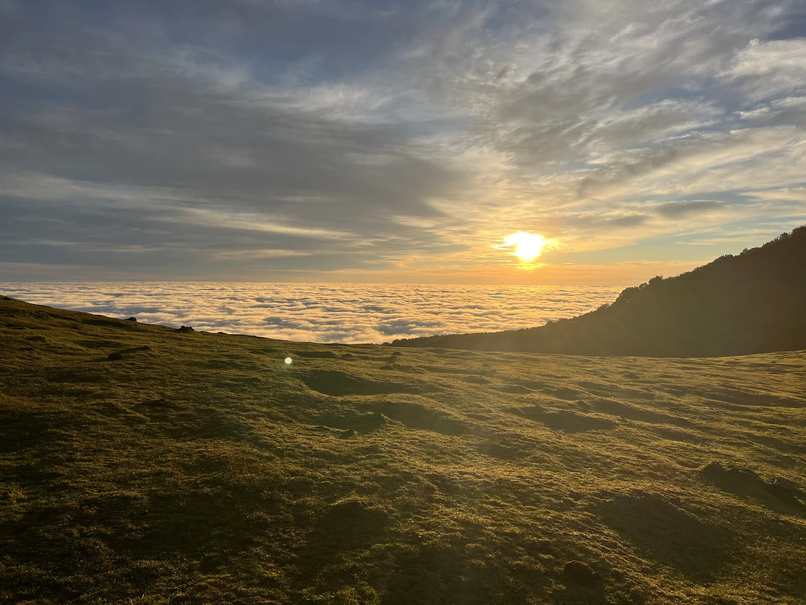 The morning sun above a sea of clouds in Madeira